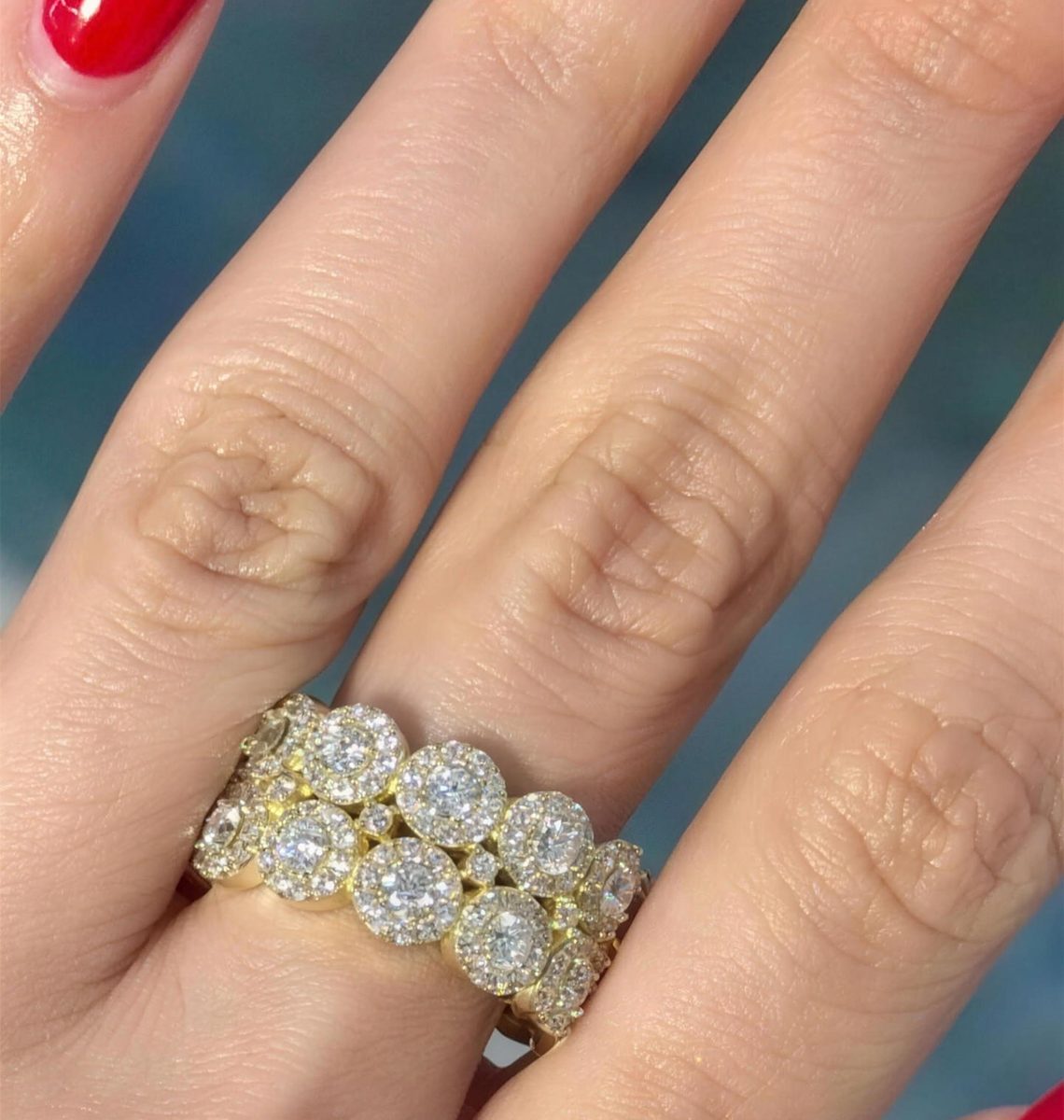 Custom double halo diamond ring built at Lazaro Davinchy, worn on hand